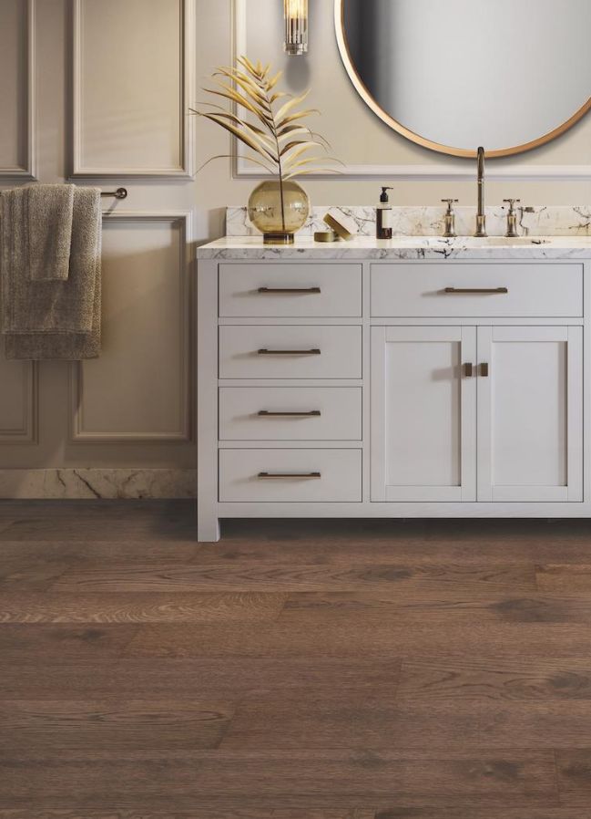 hardwood flooring in a stylish bathroom